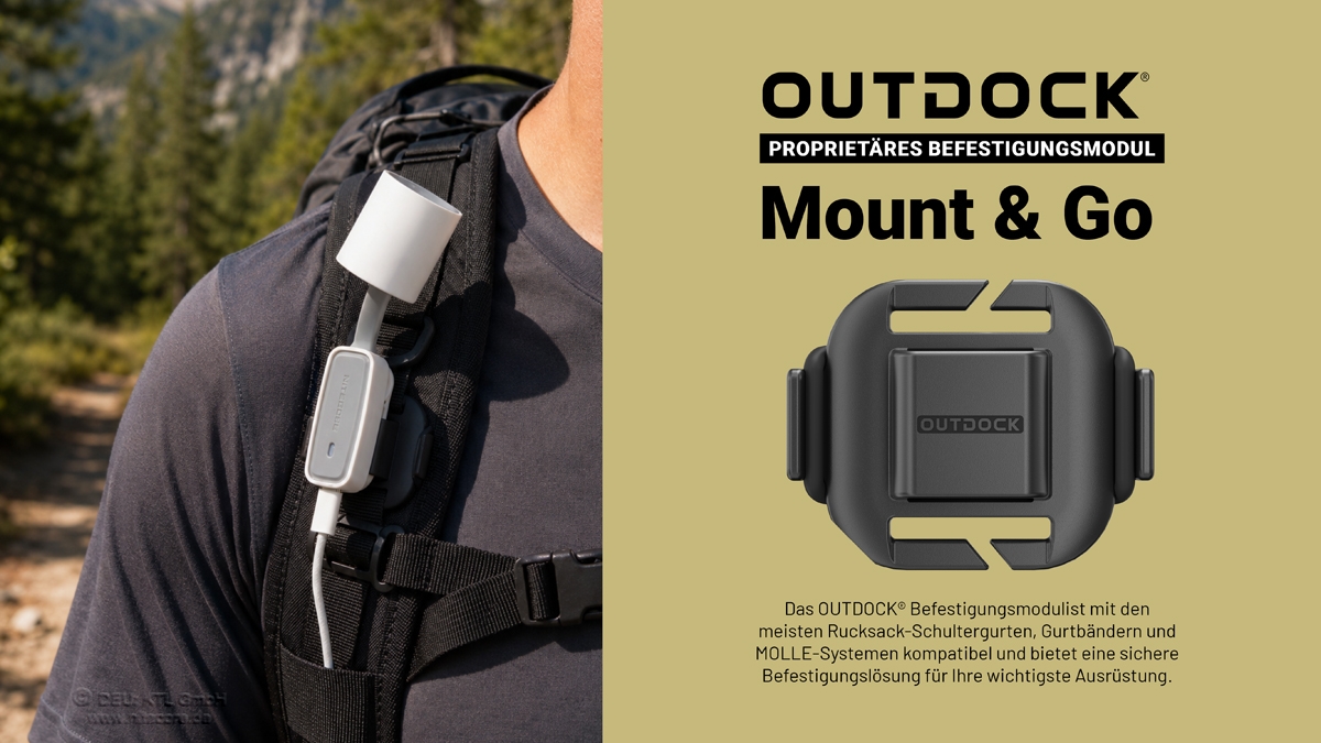 Ein OUTDOCK-Montagemodul, das an einem Rucksack-Schultergurt befestigt wird, um die Ausrüstung beim Wandern sicher zu tragen.